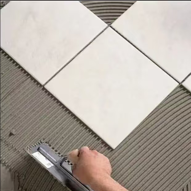 Difference Between Tile adhesive and tile back glue 